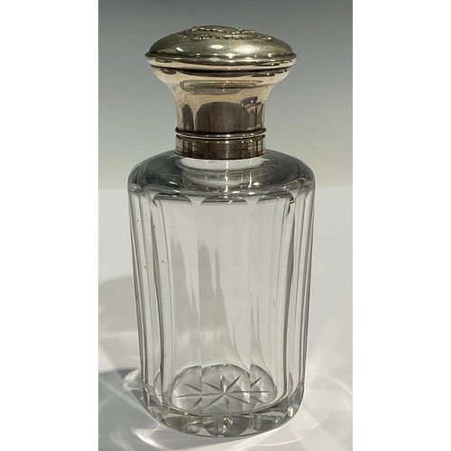99 - A French silver mounted scent bottle, the domed cover enclosing a stopper, c.1900
