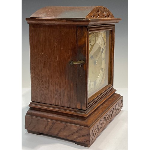 130 - An oak cased mantel clock, Camerer Cuss and Co, London, Roman numerals on silvered chapter ring, 23.... 