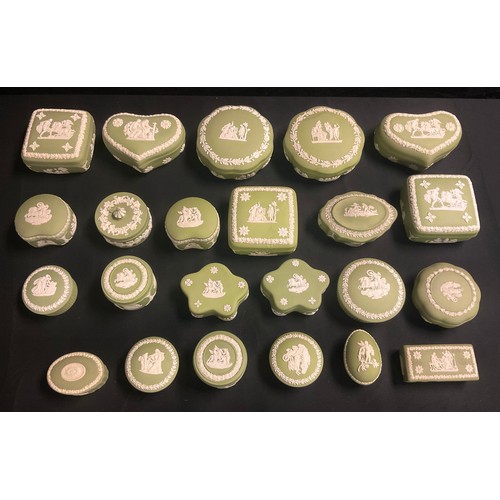 136 - A quantity of Wedgwood green jasperware trinket boxes and covers, various shapes and sizes (23)