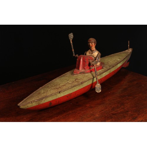 6162 - An early 20th century German tinplate and clockwork rowing boat, fitted with a lone oarsman figure w... 