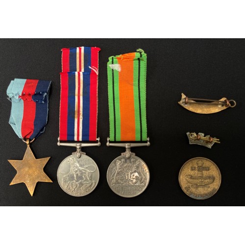 163 - WW2 British Medal Group comprising of 1939-45 Star, War Medal and Defence Medal to 6147719 Pte James... 
