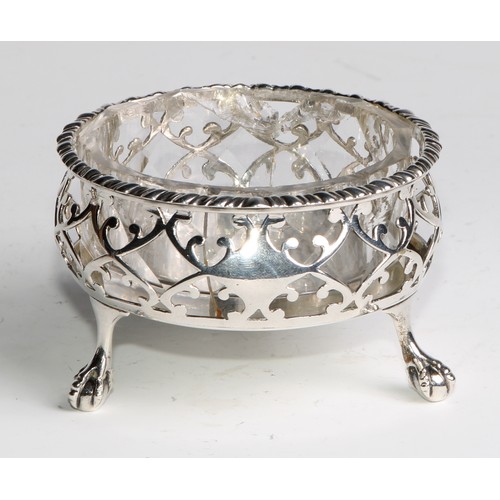 168 - A pair of large early George III silver salts, gadrooned and pierced borders, ball and claw feet, as... 