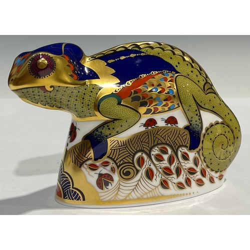 174 - A Royal Crown Derby paperweight, Chameleon, gold stopper 9cm high, red printed marks and stamp on th... 