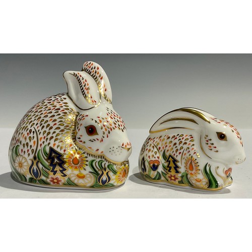 179 - An associated pair of Royal Crown Derby paperweights, Rowsley Rabbit, specially commissioned by John... 
