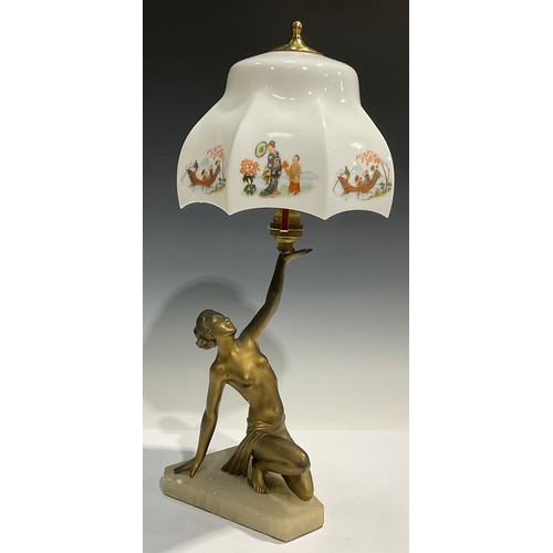 283 - An Art Deco table lamp, modelled as a scantily clad female raising the shade aloft, 46cm high