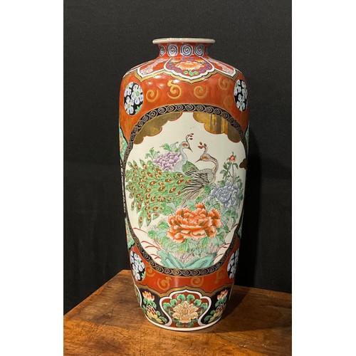 76 - An Oriental vase, decorated in polychrome with peacocks, 41cm high