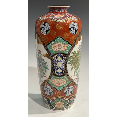 76 - An Oriental vase, decorated in polychrome with peacocks, 41cm high