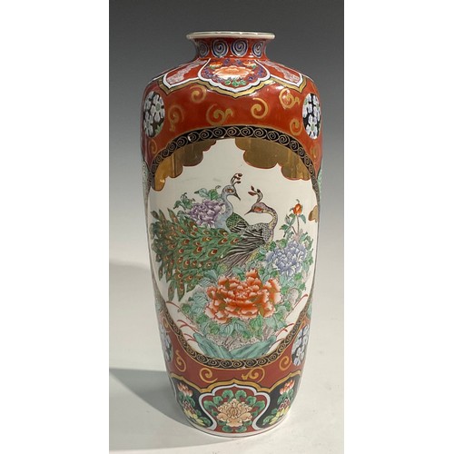 76 - An Oriental vase, decorated in polychrome with peacocks, 41cm high