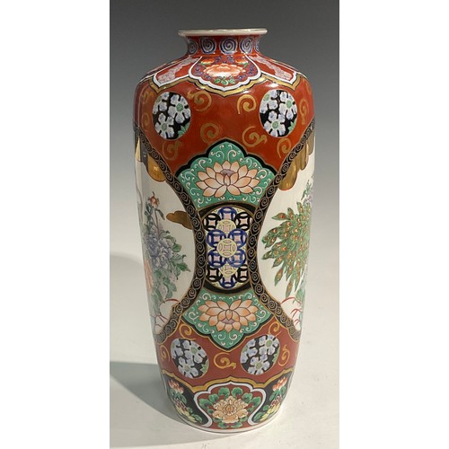 76 - An Oriental vase, decorated in polychrome with peacocks, 41cm high