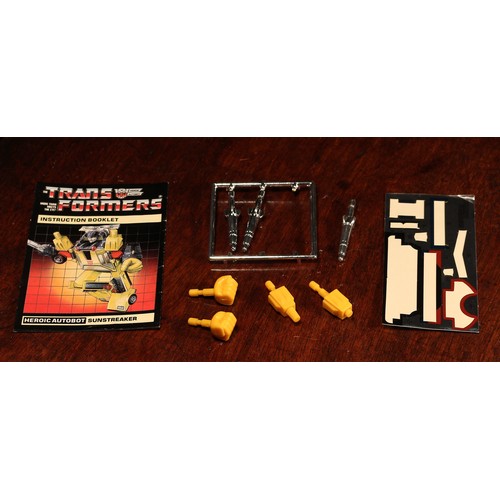 6186 - A Hasbro Transformers Autobot Warrior Sunstreaker, comprising snap-on weapons and accessories, windo... 