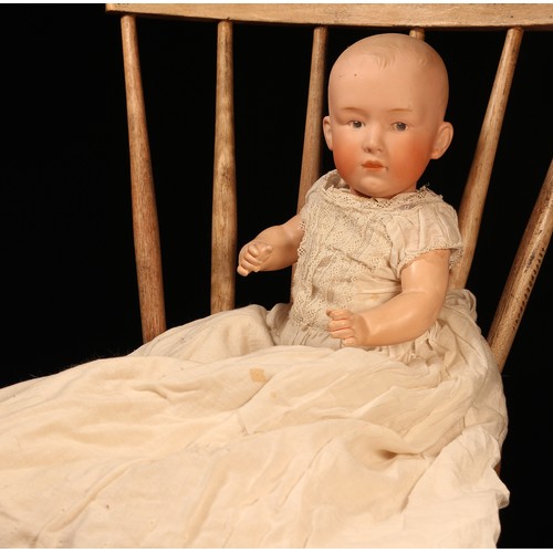 6200 - A Gebrüder Heubach (Germany) bisque head and painted composition bodied character doll, the bisque h... 