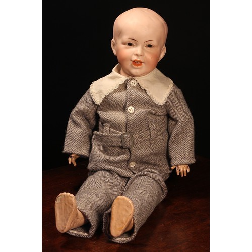 6198 - An SFBJ (France) bisque head and painted composition bodied character doll, the bisque head with fix... 