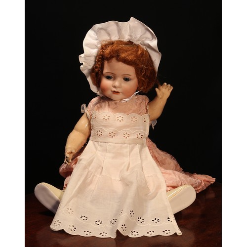 6199 - A Carl Harmus (Germany) bisque head and painted composition bodied doll, the bisque head with weight... 