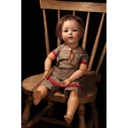 6203 - A Franz Schmidt (Germany) bisque head and ball jointed painted composition bodied doll, the bisque h... 