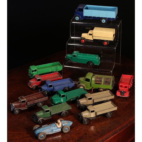 6228 - A collection of unboxed Dinky Toys, mostly commercial models, comprising two 25a open wagons, each w... 