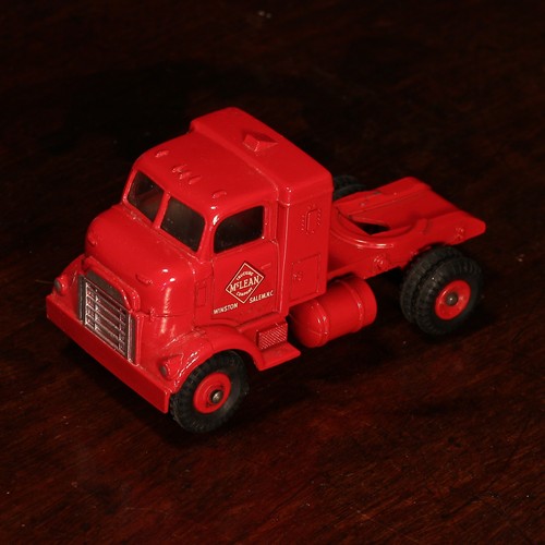 6229 - Dinky Supertoys 948 McLean tractor trailer, red cab with windows and decals to side doors, detachabl... 