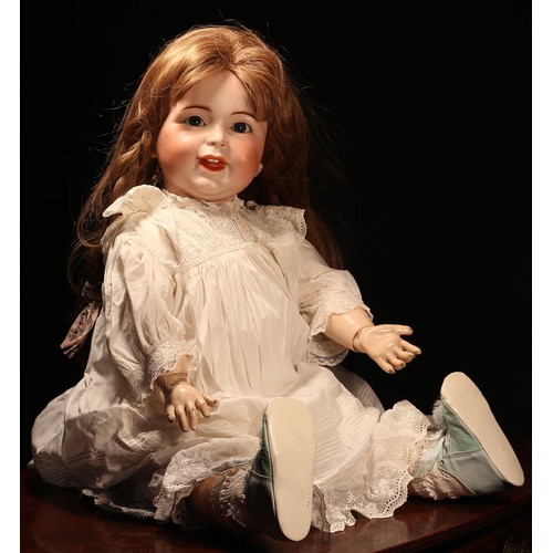 6238 - An SFBJ (France) bisque head and painted composition bodied character doll, the bisque head with wei... 