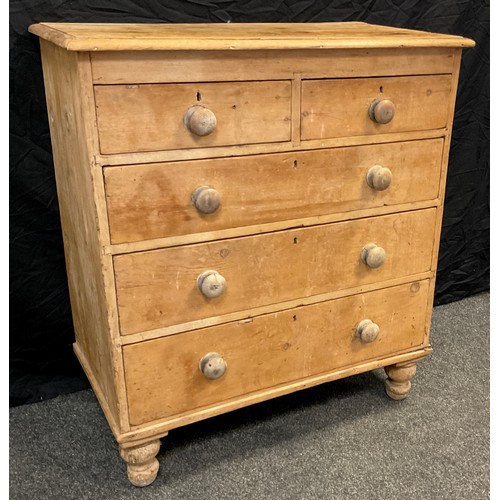 26 - A Victorian pine chest of drawers, two short over three graduated long drawers, turned feet, 105.5cm... 