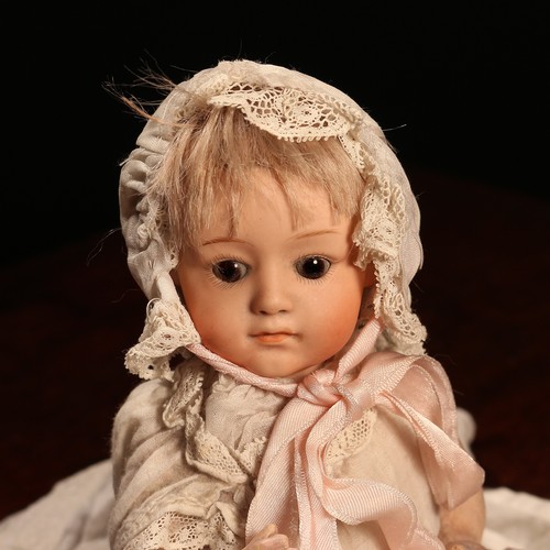 6240 - A Gebrüder Heubach (Germany) bisque head and painted composition bodied character doll, the bisque h... 