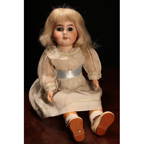 6241 - An Armand & Marseille (Germany) bisque head and ball jointed painted composition bodied doll, the bi... 