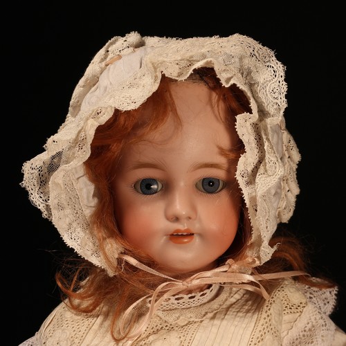 6242 - A Simon & Halbig (Germany) bisque head and ball jointed painted composition bodied doll, the bisque ... 