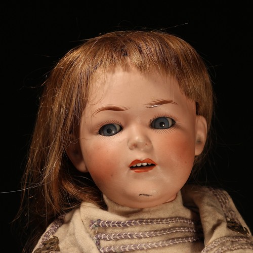 6245 - A Limbach Porzellanfabrik (Germany) bisque head and painted composition bodied doll, the bisque head... 