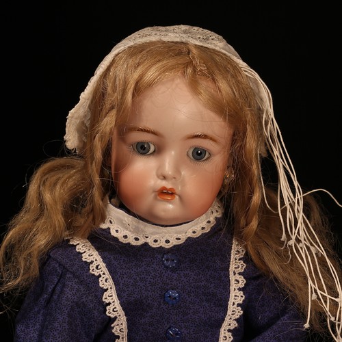 6246 - A Simon & Halbig (Germany) bisque head and ball jointed painted composition bodied doll, the bisque ... 