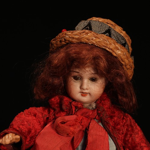 6247 - A Hermann Steiner (Germany) bisque head and painted composition bodied doll, the bisque head with we... 