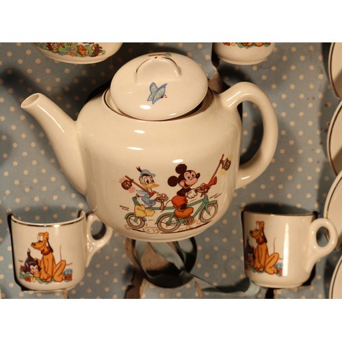 6250 - Walt Disney - a 1950's Beswick Disneyland nursery tea set, comprising teapot, sugar bowl, milk jug a... 