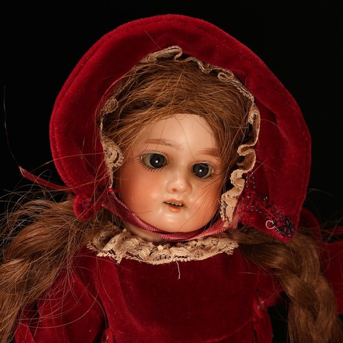 6254 - An Armand & Marseille (Germany) bisque head and painted composition bodied doll, the bisque head wit... 