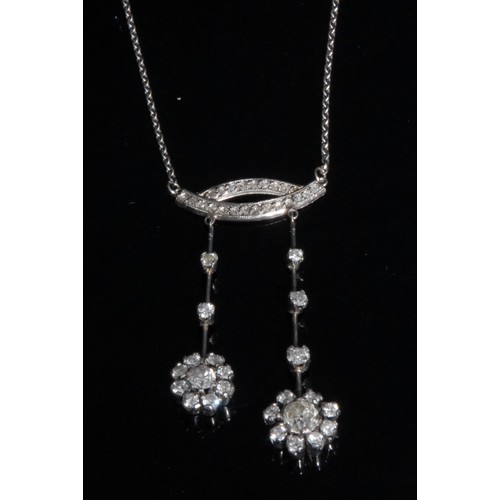 972 - A late Victorian /Edwardian diamond pendant necklace, the two floral drops, inset with forty four ol... 