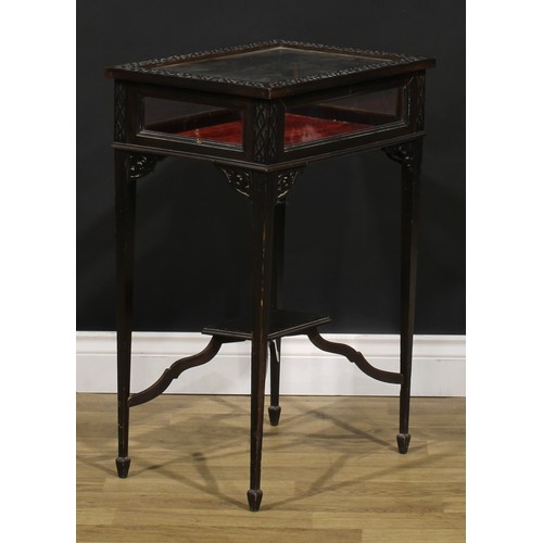 103 - An early 20th century Chippendale style mahogany bijouterie table, carved with blind fretwork, 73cm ... 