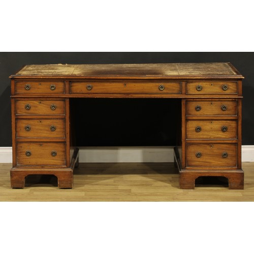 105 - A late 19th/early 20th century mahogany twin pedestal desk, 76cm high, 151.5cm wide, 70cm deep