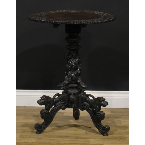 111 - An early 20th century Anglo-Indian hardwood tripod occasional table, 74.5cm high, 54.5cm diameter
