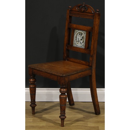 115 - A pair of late Victorian tile back oak hall chairs, of Shakespearean interest, the Shakespeare serie... 