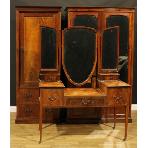 120 - An early 20th century mahogany three-piece bedroom suite, comprising wardrobe, 198cm high, 117cm wid... 