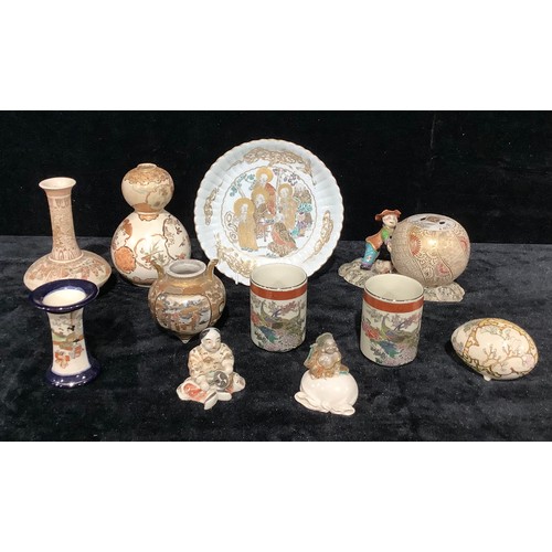 145 - Oriental Ceramics - Satsuma; A fluted vase, ovoid vase, a potpourri pot, other vases and figures, qt... 