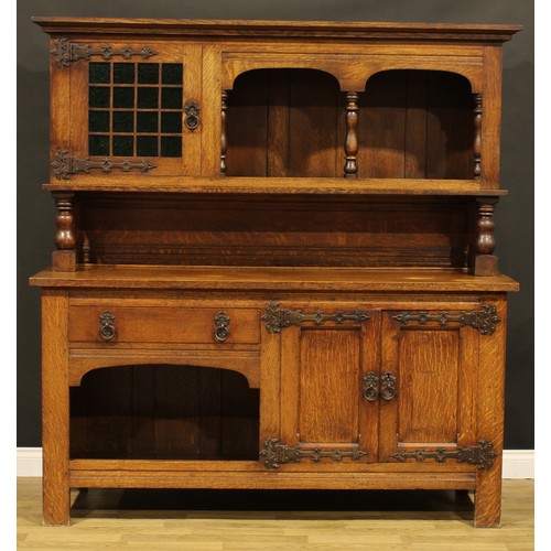 208 - An Arts & Crafts style oak dog kennel dresser, 184.5cm high, 180cm wide, 56cm deep