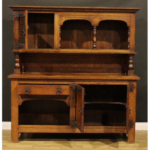 208 - An Arts & Crafts style oak dog kennel dresser, 184.5cm high, 180cm wide, 56cm deep