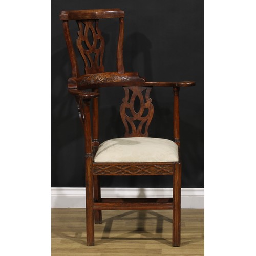 211 - A George III Revival beech, ash and elm corner chair, 117cm high, 79cm wide, the seat 43cm square