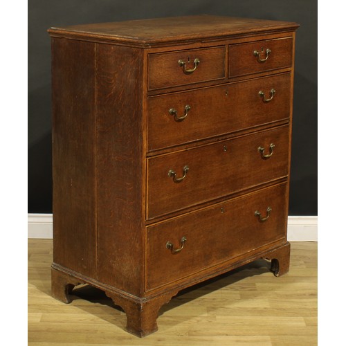 218 - A George III oak chest, of two short and three long drawers, 107.5cm high, 91.5cm wide, 51cm deep