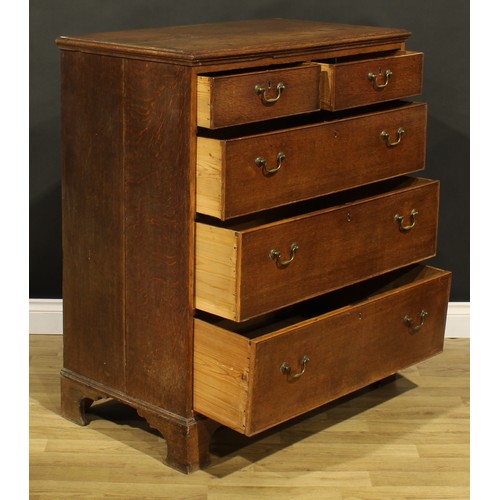 218 - A George III oak chest, of two short and three long drawers, 107.5cm high, 91.5cm wide, 51cm deep