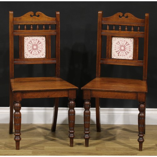 219 - A pair of Aesthetic Movement walnut hall chairs, 85.5cm high, 42.5cm wide, the seat 33cm deep (2)