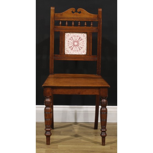 219 - A pair of Aesthetic Movement walnut hall chairs, 85.5cm high, 42.5cm wide, the seat 33cm deep (2)