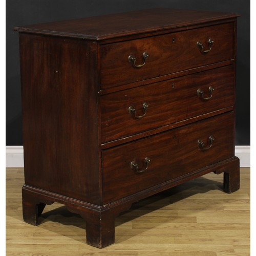1248 - A George III mahogany chest, oversailing top above three long graduated drawers, brass swan neck han... 