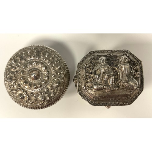 3 - A Burmese pierced and repoussé decorated canted rectangular Ramayana silver box, decorated with trad... 