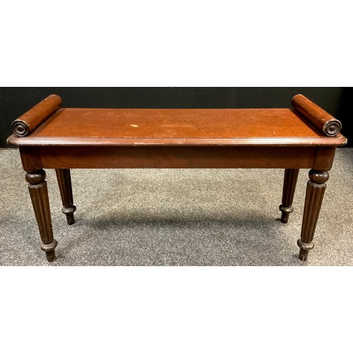 681 - A Victorian style mahogany window seat, pillow-scroll ends applied with draught turned roundels, rou... 