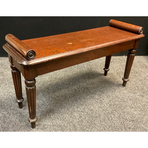 681 - A Victorian style mahogany window seat, pillow-scroll ends applied with draught turned roundels, rou... 