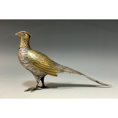 7 - A Continental silver and silver gilt novelty pepperette or casting bottle, as a pheasant, with detac... 