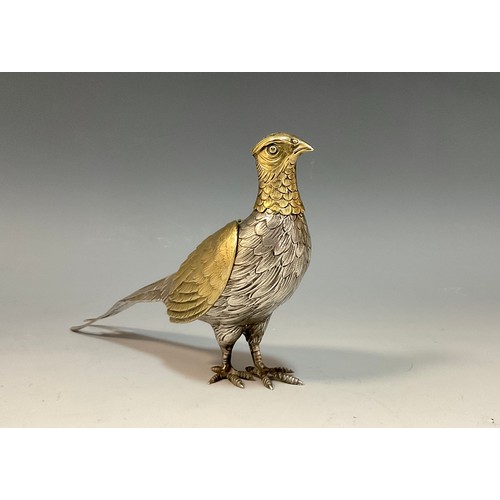 7 - A Continental silver and silver gilt novelty pepperette or casting bottle, as a pheasant, with detac... 